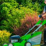 Man mowing his front lawn